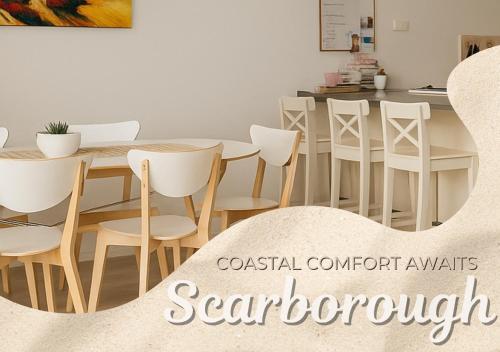 a dining room with a table and chairs at West Beach Lagoon 221 - Ocean Peep Scarborough in Perth