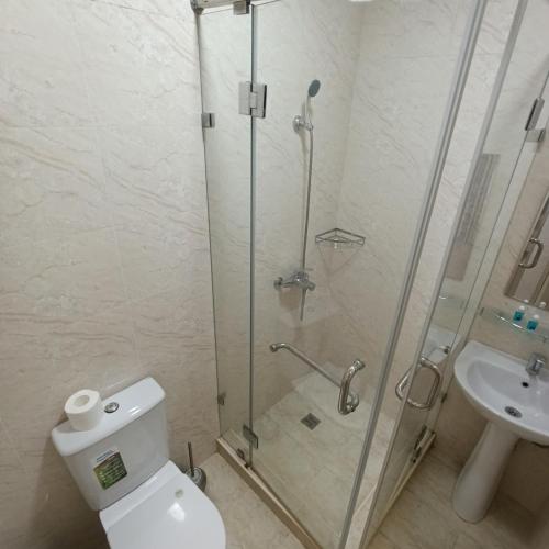 Koupelna v ubytování Grand Caravan Hotel