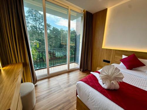 Postel nebo postele na pokoji v ubytování Zaad Suites