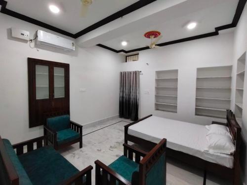 Una cama o camas en una habitación de Peace Ace Homestay Jaisalmer