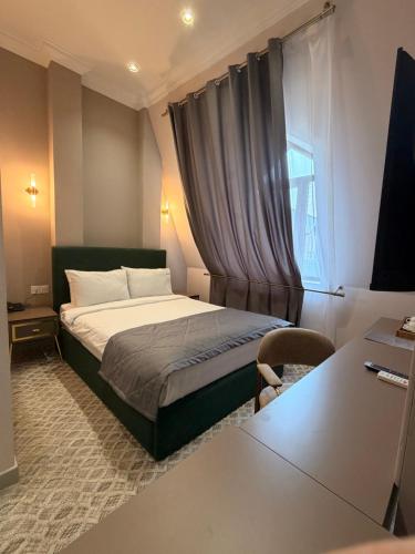 Ένα ή περισσότερα κρεβάτια σε δωμάτιο στο The Address by Maestro