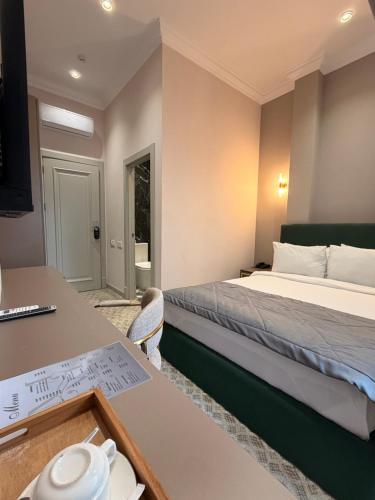 Ένα ή περισσότερα κρεβάτια σε δωμάτιο στο The Address by Maestro