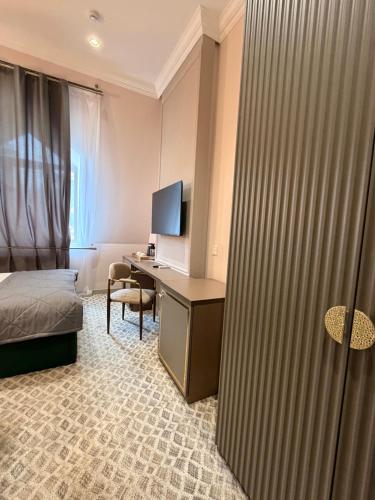 TV/Unterhaltungsangebot in der Unterkunft The Address by Maestro