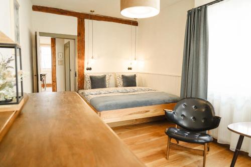 Voodi või voodid majutusasutuse Urlaubsfreude Biedermann Haus Blumenglück - Vergissmeinnicht toas