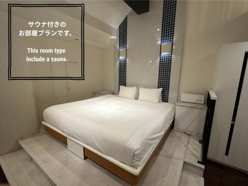 Voodi või voodid majutusasutuse Hotel Rima chocolat toas