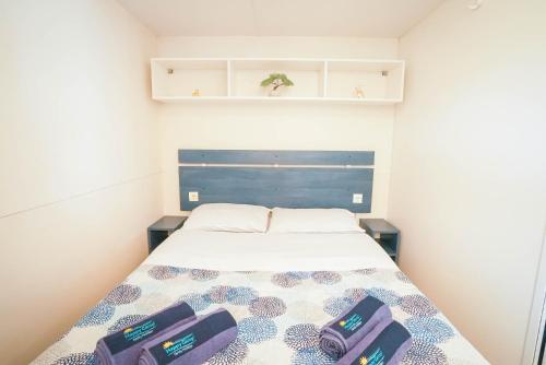 Postel nebo postele na pokoji v ubytování Happy Camp Mobile Homes in Lido di Sesto Camping Boats&Restaurant