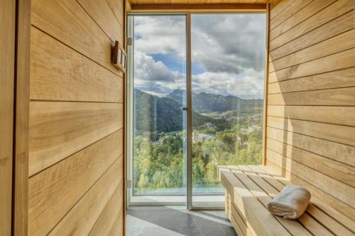 a door leading to a room with a window at Hotel Pieniny Grand Wellness & SPA - Destigo Hotels in Szczawnica