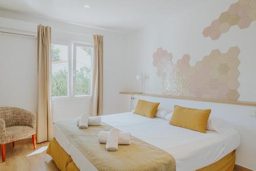 En eller flere senge i et værelse på Villa Santo Tomás - Adriana