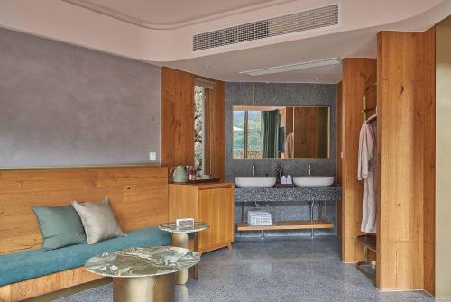 Postel nebo postele na pokoji v ubytování Tonglu TianKong MiLing Homestay