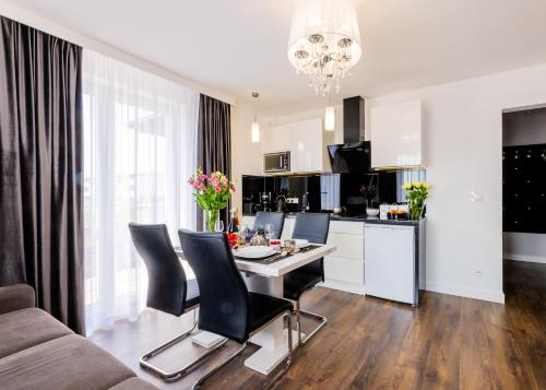 Η κουζίνα ή μικρή κουζίνα στο Sunrise Apartaments