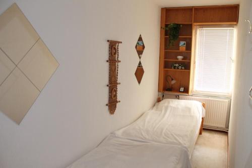 Postel nebo postele na pokoji v ubytování Ferienwohnung F331 für 2-4 Personen an der Ostsee