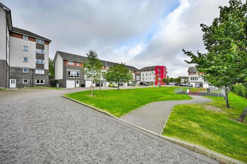 an empty street in a campus with buildings and trees at Aberdeen 2BR Flat Near Airport & City Centre in Aberdeen
