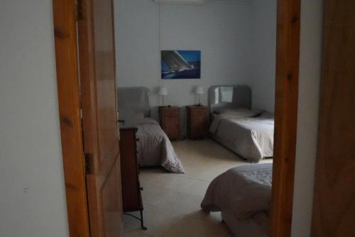 Postel nebo postele na pokoji v ubytování فيلا الدانة