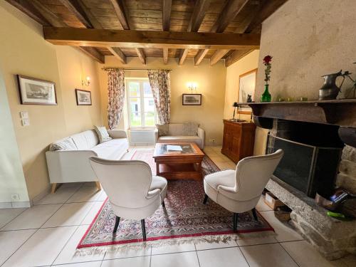 Ruang duduk di Gite Vert Maison Bretonne