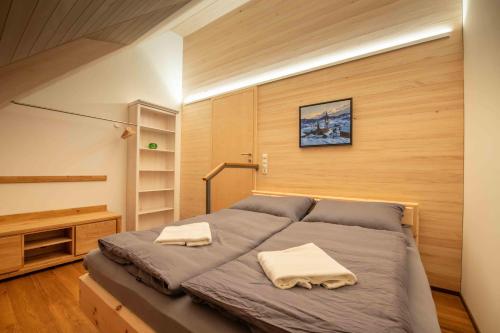 Ένα ή περισσότερα κρεβάτια σε δωμάτιο στο Zum Schmied