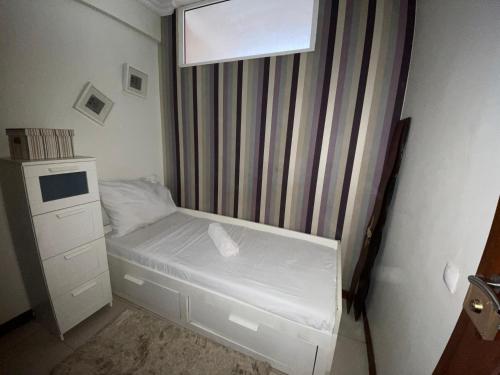 Postel nebo postele na pokoji v ubytování The Fifth