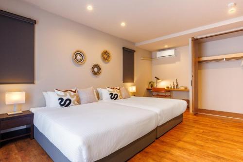 Ένα ή περισσότερα κρεβάτια σε δωμάτιο στο 4 minutes by car to American Village Free parking included Accommodates up to 16 people Spacious house tocoa