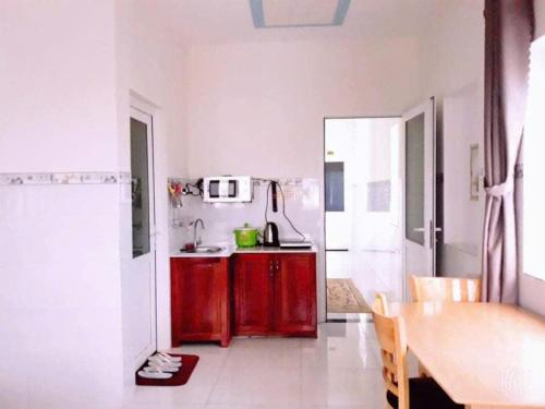 Kuchyň nebo kuchyňský kout v ubytování Queen Motel Vung Tau