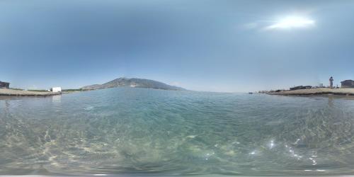 an island in the middle of a body of water at Unik Private Villa Center in Velipojë