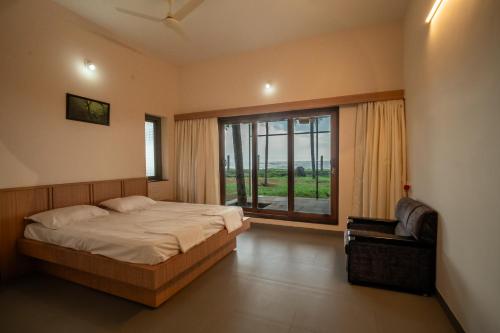 Postel nebo postele na pokoji v ubytování Vitamin Sea Shiriya