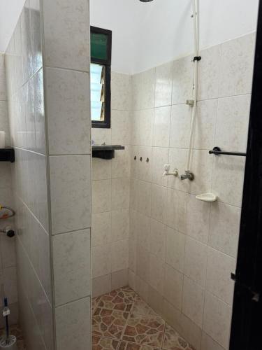 Koupelna v ubytování Raine house