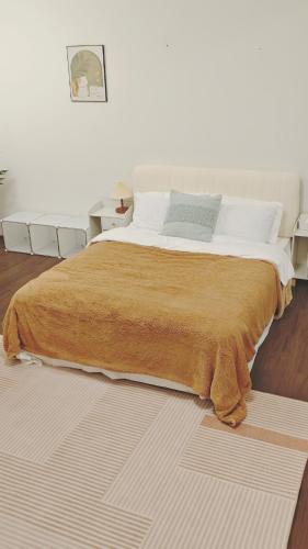 Ένα ή περισσότερα κρεβάτια σε δωμάτιο στο 12A NEST Chatswood