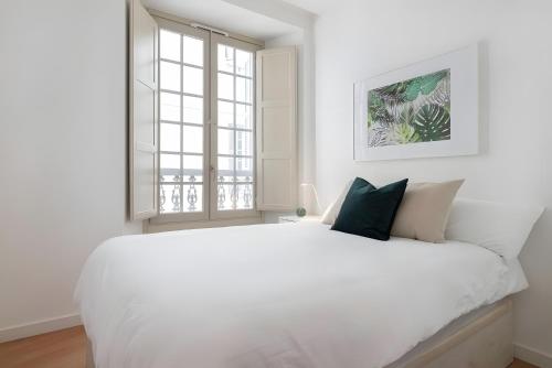 Ένα ή περισσότερα κρεβάτια σε δωμάτιο στο Luxury 2 bedroom Plaza Alcantara