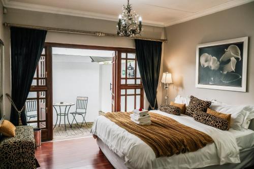 Postel nebo postele na pokoji v ubytování Lamon Guesthouse