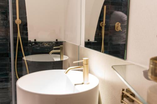 Koupelna v ubytování Madia's House by MONHOLIDAY