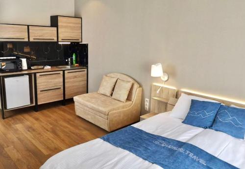 Kuchyň nebo kuchyňský kout v ubytování New Gudauri GoodHost Apartments