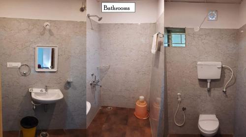 ein Badezimmer mit Waschbecken, Toilette und Dusche in der Unterkunft Sharmada Hidden Nest Resort in Jāmb