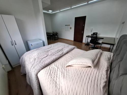 Postel nebo postele na pokoji v ubytování Studio central na cidade do Cristo