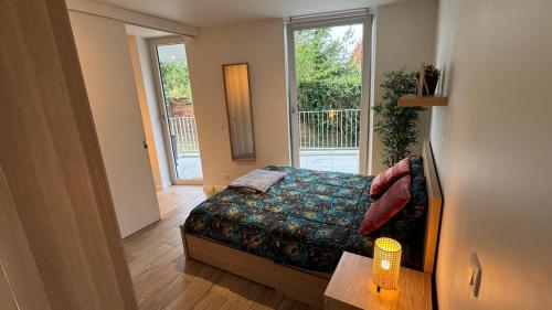 Ένα ή περισσότερα κρεβάτια σε δωμάτιο στο Casa Kim