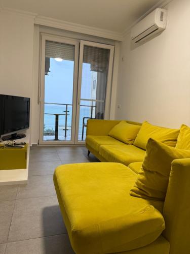 TV a/nebo společenská místnost v ubytování holiday shengjin kune