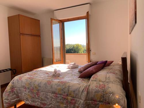 Postel nebo postele na pokoji v ubytování A Casa di Olga by Holiday World