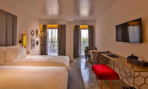Postel nebo postele na pokoji v ubytování 2Ciels Boutique Hôtel