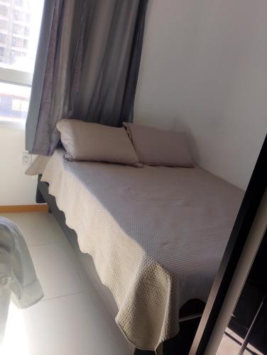 Postel nebo postele na pokoji v ubytování Studio Novo Próximo a Praia