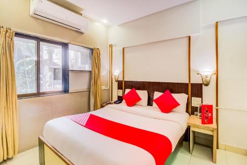 Ένα ή περισσότερα κρεβάτια σε δωμάτιο στο Collection O Panchratna