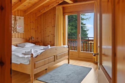 Postel nebo postele na pokoji v ubytování Maison Crans-Montana, 7 pers - 7 lits, Jardin & Carnotzet