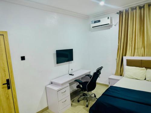 TV a/nebo společenská místnost v ubytování Marina Serviced Apartments - Lekki, Lagos