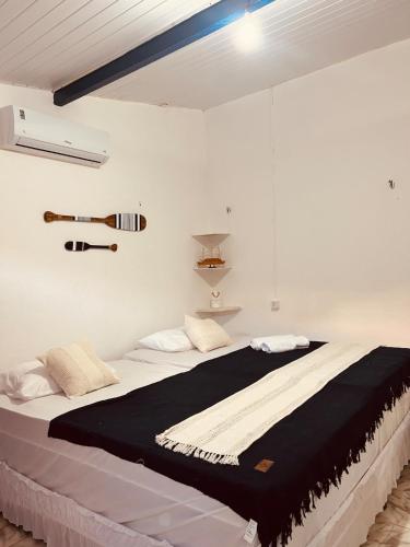 Postel nebo postele na pokoji v ubytování Suíte Privativa com conforto