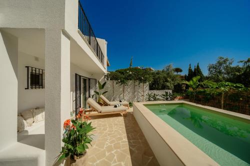 Modern townhouse with private heated pool near Cabopino beach in Artola, Marbella