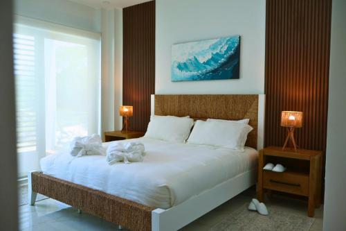 Postel nebo postele na pokoji v ubytování Acqua di Mare Resort