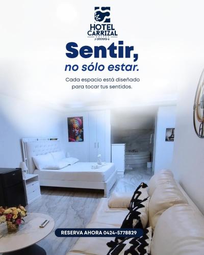 Ένα ή περισσότερα κρεβάτια σε δωμάτιο στο Hotel Carrizal Suites