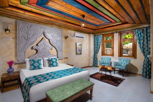 Postel nebo postele na pokoji v ubytování Premium Cappadocia House