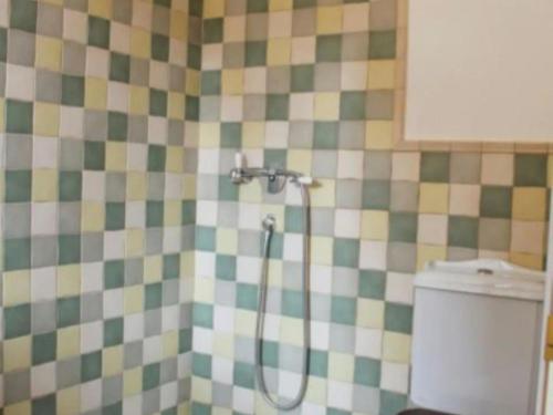 a shower in a bathroom with a tiled wall at Villa - 5 Bedrooms with WiFi - 7841 in A Estrada