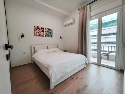 Center Athens all new and fully equipped 2 bedrooms 82 sqm big sea view apt close to Acropoli with Lift