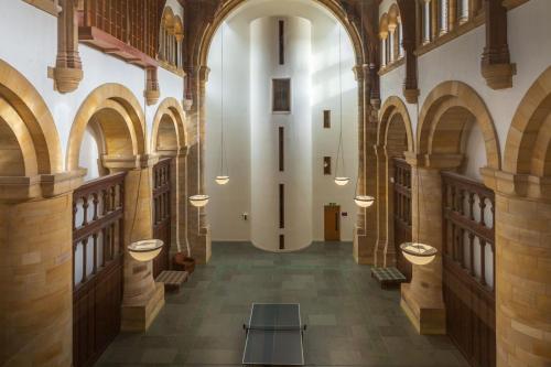 a hallway in a building with sinks in it at Abbey Church 20 in Fort Augustus