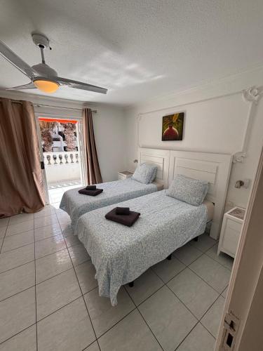 Postel nebo postele na pokoji v ubytování Parque Santiago 2, Villa 1, Tenerife Dream Properties