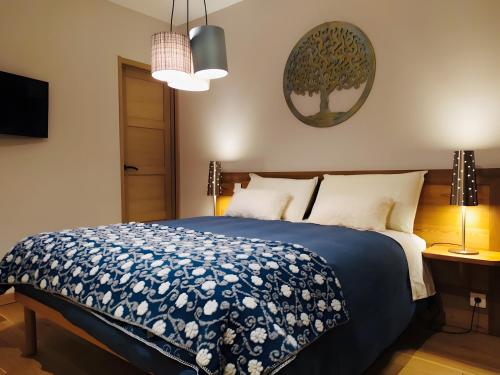 Ένα ή περισσότερα κρεβάτια σε δωμάτιο στο La Baïta De La Foux